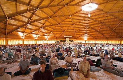 a large group of meditators gather for peace